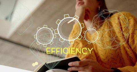 Woman holding notebook and planning with efficiency gears overlay in mustard sweater