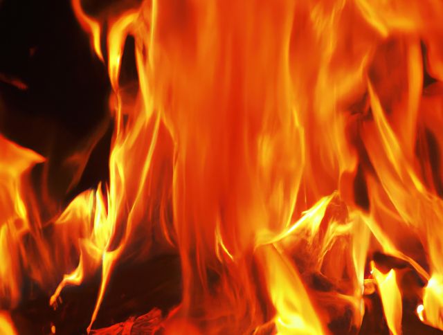 Vivid depiction of intense flames and burning fire. Useful for topics related to heat, fire safety, combustion, or energy. Ideal for backgrounds, presentations, warnings about fire hazards, or as visual content for themes of intensity and danger.