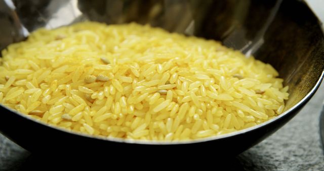 Close-Up Yellow Rice in Bowl - Download Free Stock Images Pikwizard.com