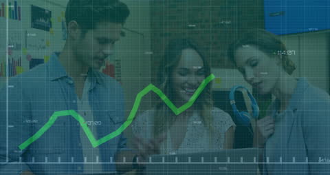Colleagues Analyzing Financial Growth Data in Modern Office