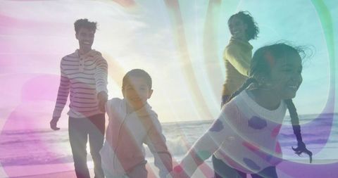Joyful Family Running on Beach at Colorful Sunset