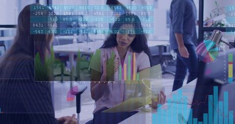 Business team reviewing data, charts overlays, woman holding folder discussing insights