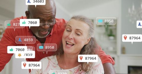 Senior Diverse Couple Engaging with Social Media Icons