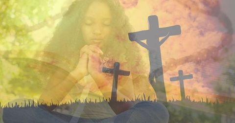 Young Girl Praying with Overlapping Crosses Symbolizing Faith
