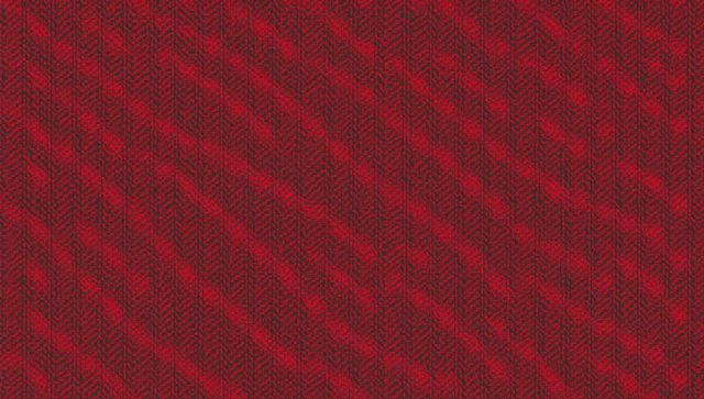 Closeup burgundy herringbone woven textile macro texture featuring ribbed chevron pattern