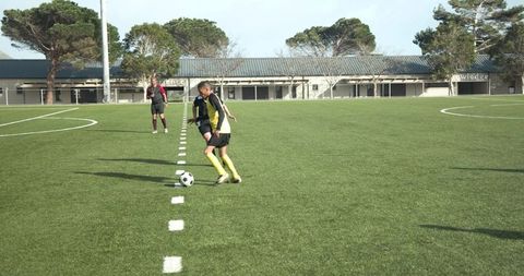 Youth Soccer Team Competing Intense Match on Sunny Field