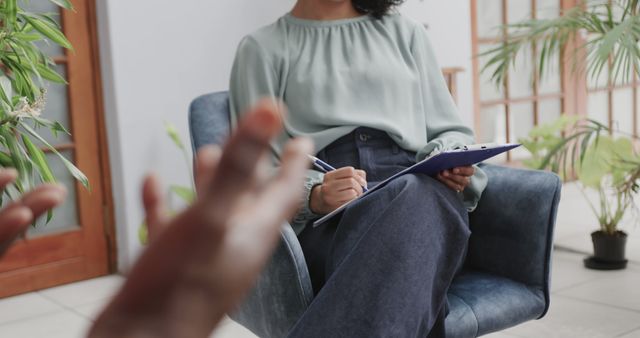 female therapist listening to patient during counseling session indoors - Download Free Stock Images Pikwizard.com