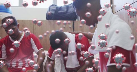 Soccer Players Adapting to Virus Precautions in Locker Room