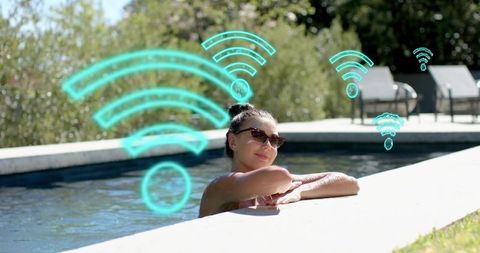 Woman relaxing at pool edge with wi-fi signal overlays, outdoor leisure and connected lifestyle