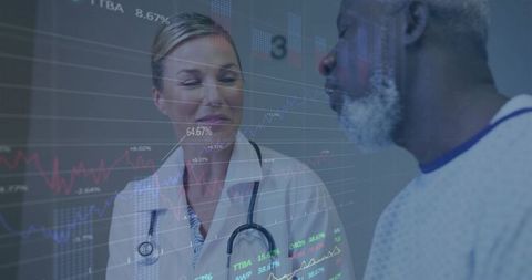 Physician Consulting Patient with Digital Data Overlay in Exam Room