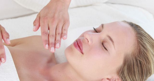 Relaxed Woman Receiving Reiki Healing Therapy - Download Free Stock Images Pikwizard.com