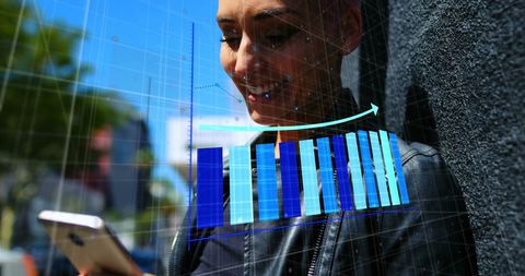 Woman Analyzing Data Graphs on Smartphone in Urban Environment