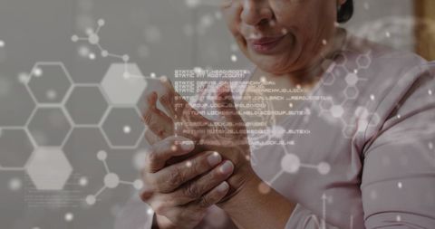 Digital Health Interface Over Senior Woman with Hand Pain