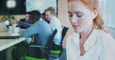 Businesswoman analyzing digital data at office conference room