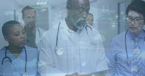 Healthcare Professionals Review Analytics in Hospital Corridor