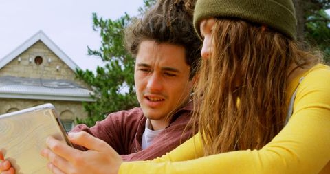 young adults puzzled by problem on digital device - Download Free Stock Images Pikwizard.com