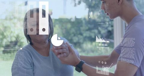 Caregiver helping senior woman with arm exercise at sunlit window wearing smartwatch and ar overlays