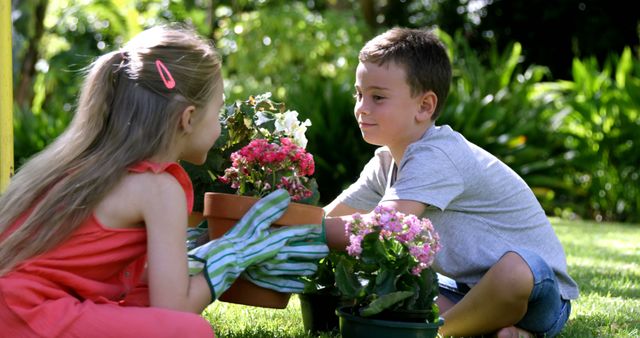 Children Gardening Together with Flower Pots in Lush Backyard - Download Free Stock Photos Pikwizard.com