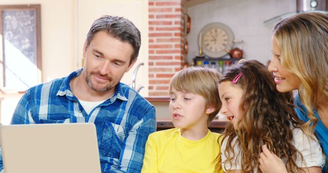 Family Using Laptop at Home for Education and Entertainment - Download Free Stock Images Pikwizard.com