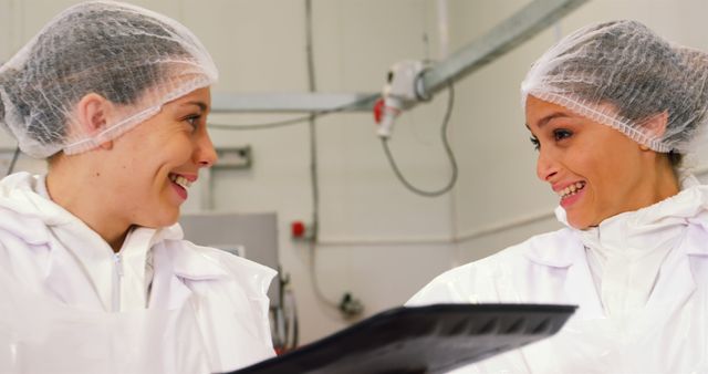 Smiling Female Workers in Meat Processing Factory - Download Free Stock Images Pikwizard.com