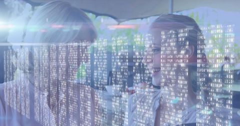 Mother and Daughter in Modern Cafe with Digital Binary Overlay