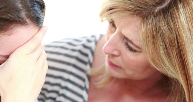 Woman comforting distraught friend in emotional support moment - Download Free Stock Images Pikwizard.com