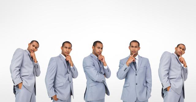 This image shows multiple identical businessmen in light gray suits, all in a thoughtful pose. Ideal for illustrating concepts related to decision making, strategic planning, leadership, and corporate thinking. Useful for business presentations, articles on professional development, and marketing materials focused on business strategy.