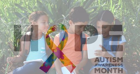 Children promoting autism awareness with digital technology outdoors