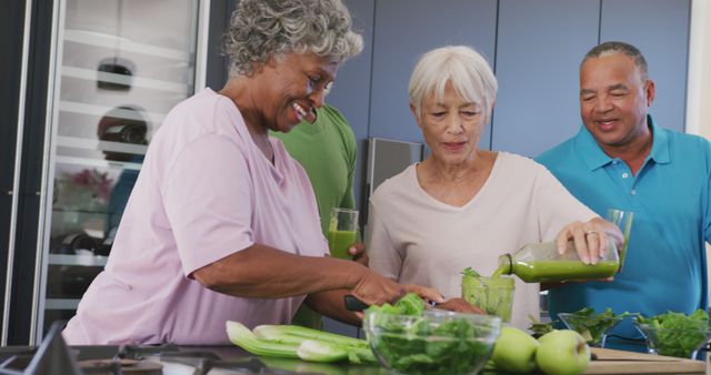 Senior Friends Making Healthy Smoothies in Modern Kitchen - Download Free Stock Images Pikwizard.com