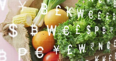 Fresh market produce with floating currency symbols highlighting food price trends