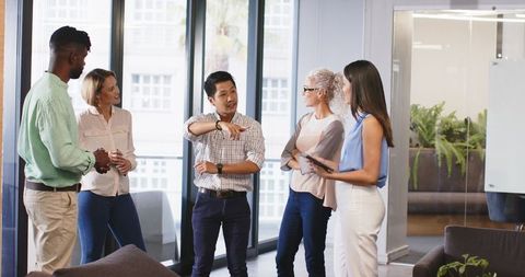 Business team engaged in productive office discussion