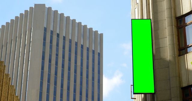 Modern office buildings with green screen billboard in urban area - Download Free Stock Images Pikwizard.com