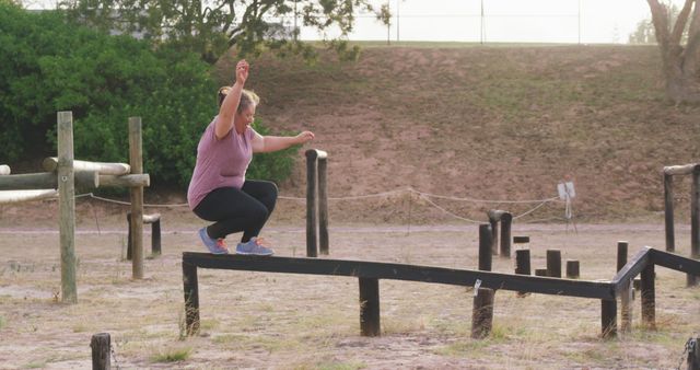 Woman Training on Outdoor Obstacle Course - Download Free Stock Images Pikwizard.com