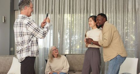 Multiracial therapy session celebration with patient and therapist photo setup