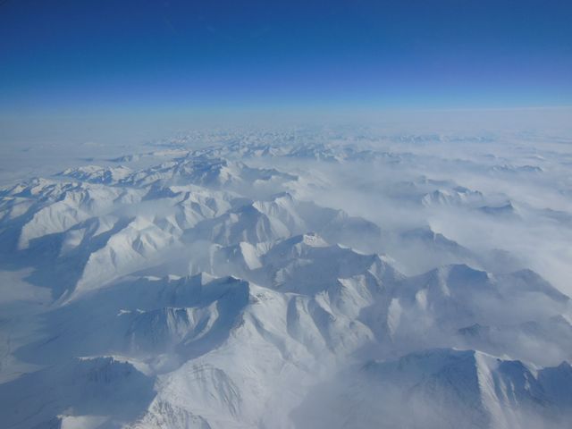 Aerial View of Snow-Covered Alaskan Mountains from NASA IceBridge Mission - Download Free Stock Photos Pikwizard.com
