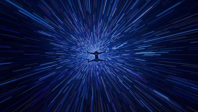 Futuristic drone racing through cosmic light tunnel with radial neon streaks