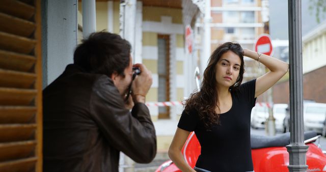 Photographer Capturing Stylish Woman on City Street - Download Free Stock Images Pikwizard.com