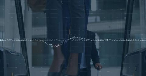 Business travelers amid digital financial data overlay