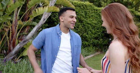 Romantic Engagement Proposal in Beautiful Garden Setting