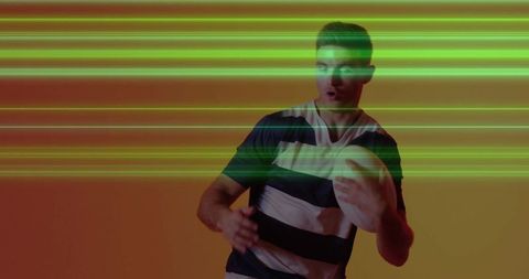 Dynamic Rugby Athlete on Vibrant Orange Background with Green Motion Lines