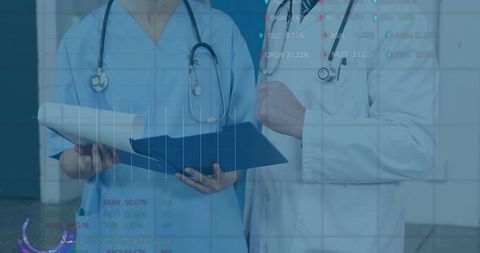 Clinicians reviewing patient data overlays, nurse in scrubs and doctor checking blue folder