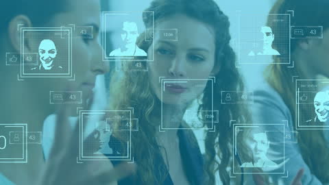 Digital Interface Holograms Hovering over Diverse Businesspeople Discussing