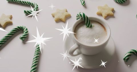 Festive Hot Beverage with Candy Canes and Star Cookies - Download Free Stock Images Pikwizard.com
