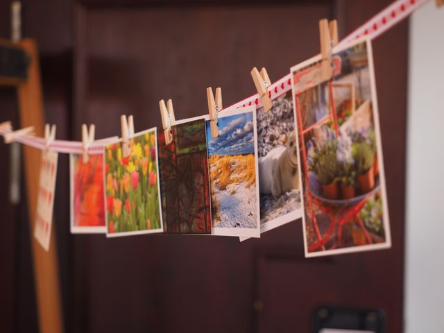 Colorful Postcards Hanging on a String with Clothespins - Download Free Stock Photos Pikwizard.com