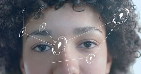 Innovative Businesswoman with Vision and Technology Overlay