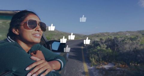 Woman Enjoying Scenic Drive Amidst Rural Landscape with Likes