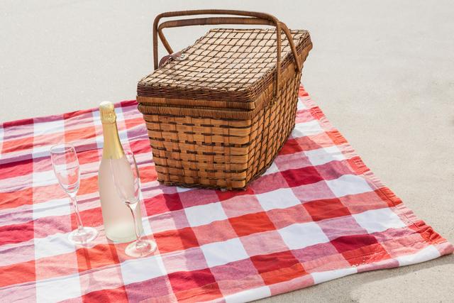Picnic Setup with Champagne on Beach Blanket - Download Free Stock Photos Pikwizard.com