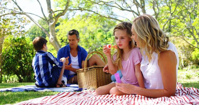 Family Picnicking in Park on Sunny Day - Download Free Stock Images Pikwizard.com