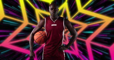 Basketball Player Posed Against Neon Star Background