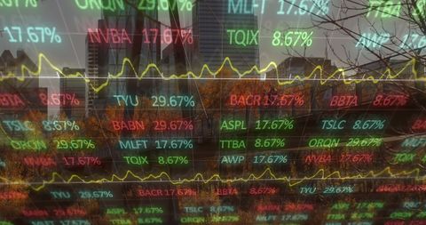 Financial Data Charts Superimposed on Urban Skyline